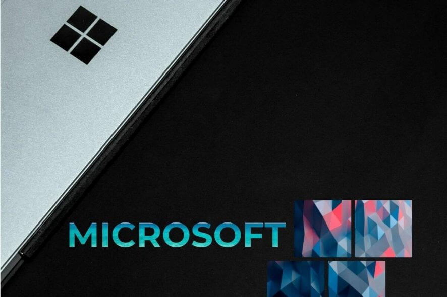 Can't download OneDrive files - laptop on table with logo