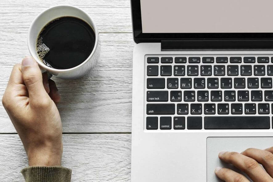 Microsoft Teams won't connect to meeting - laptop with coffee