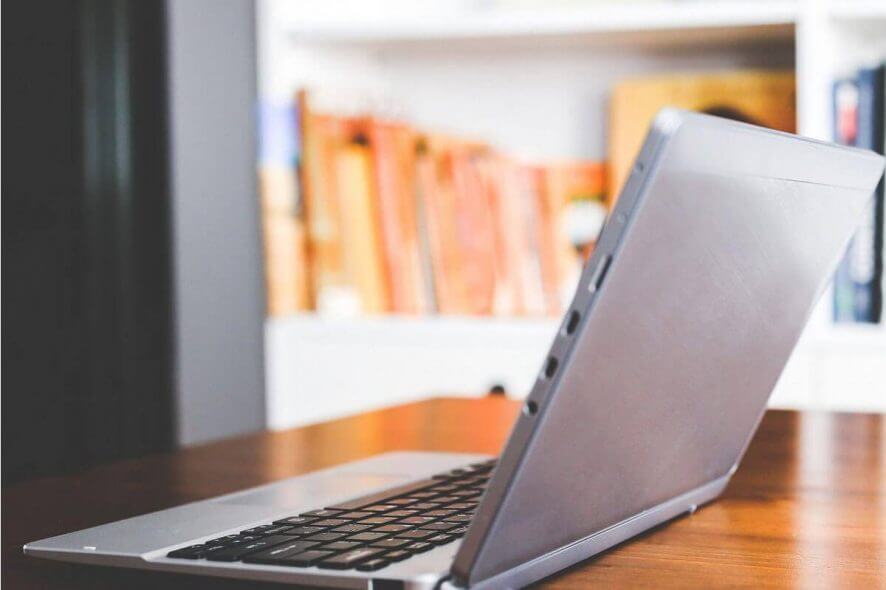 laptop on desk - how to redeem codes on Arc